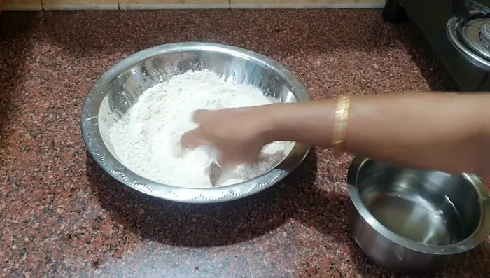 Gradually add water and knead the dough well. The more you knead, the softer the dough will be.