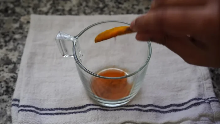 Make a spice paste by mixing 1 teaspoon each of turmeric powder, Kashmiri chili powder, cumin powder, 1 teaspoon of grated ginger, and 1/3 cup of water.