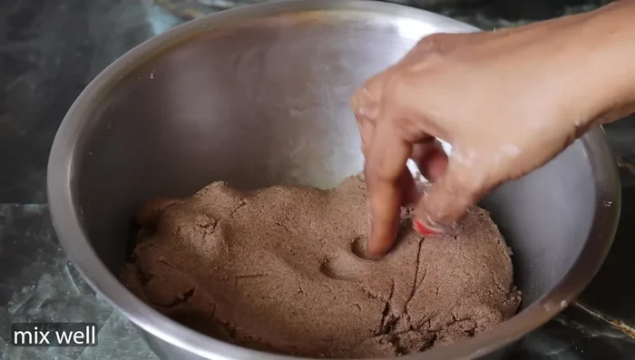Knead the dough until smooth. Add more ragi or wheat flour if the dough is too wet, or add a little water or milk if it's too thick.