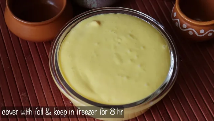 Transfer the paste to a container, cover with a towel, and mix well.
