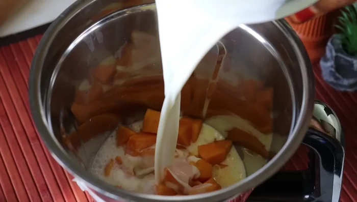Add 1 cup of boiled and cooled raw milk (ensure it's thick and creamy).