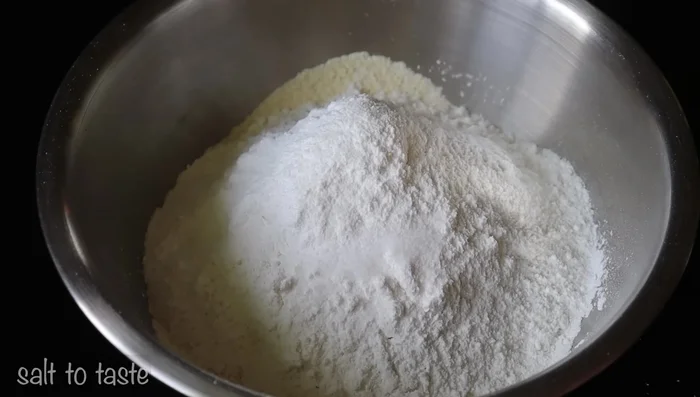 Add salt, chili powder (1 tsp or more), and turmeric powder (½ tsp). Mix well.
