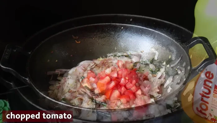 Add chopped tomatoes and fry well.