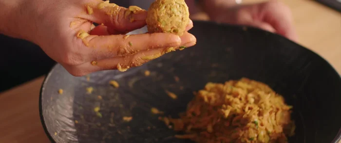 Shape the mixture into medium-sized koftas using a spoon to make portioning easier.