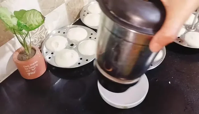 Add tamarind pulp and water, grind to desired thickness. The chutney should be thick, not diluted.