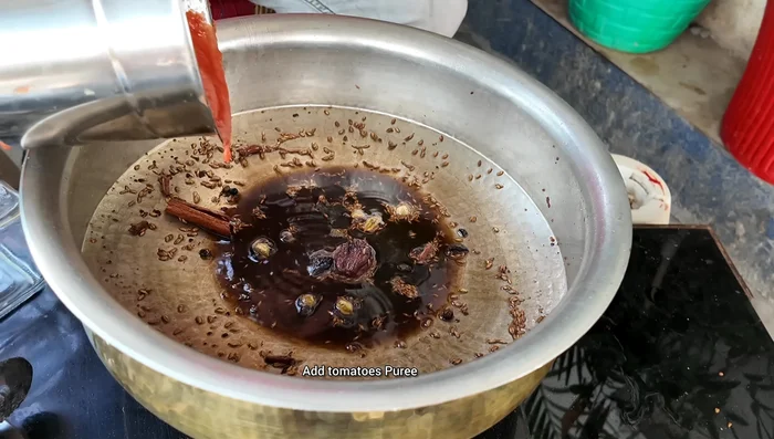 Add the tomato paste and cook for 5 minutes on high flame.