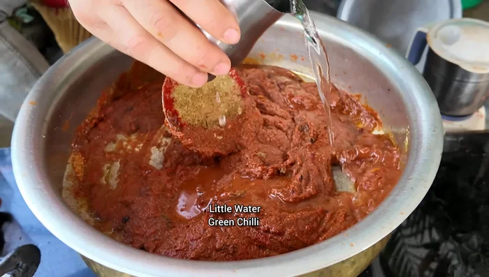 Add remaining cumin seeds, a little water, and green chilies. Cook for another 5 minutes on high flame.