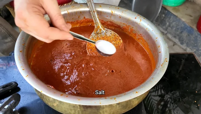 Add salt, a little water, and garam masala powder. Bring to a light boil.