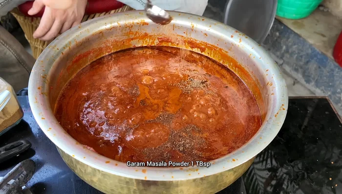 Add the fried paneer pieces and simmer for 2-3 minutes on high flame, then lower the heat and simmer for 20 minutes.
