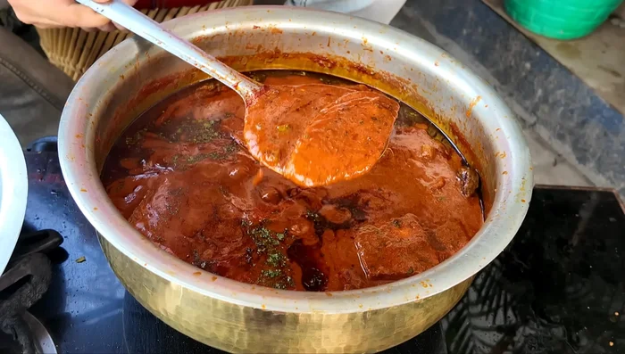 Stir in crushed fenugreek leaves and serve hot.
