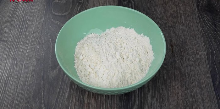 In a mixing bowl, add 1 cup of flour, 1 tbsp ghee, 2 tsp sugar, and 1 tsp salt. Mix well. You can use whole wheat flour for extra fiber.