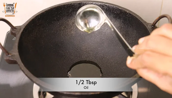 Heat oil in a pan. Add raw chickpeas and black gram flour. Fry until lightly cooked.