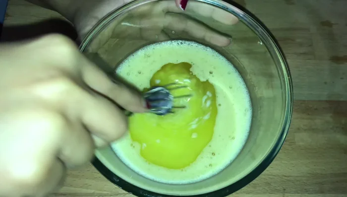 Mix 1 cup of sugar and 1/2 cup of melted butter well.