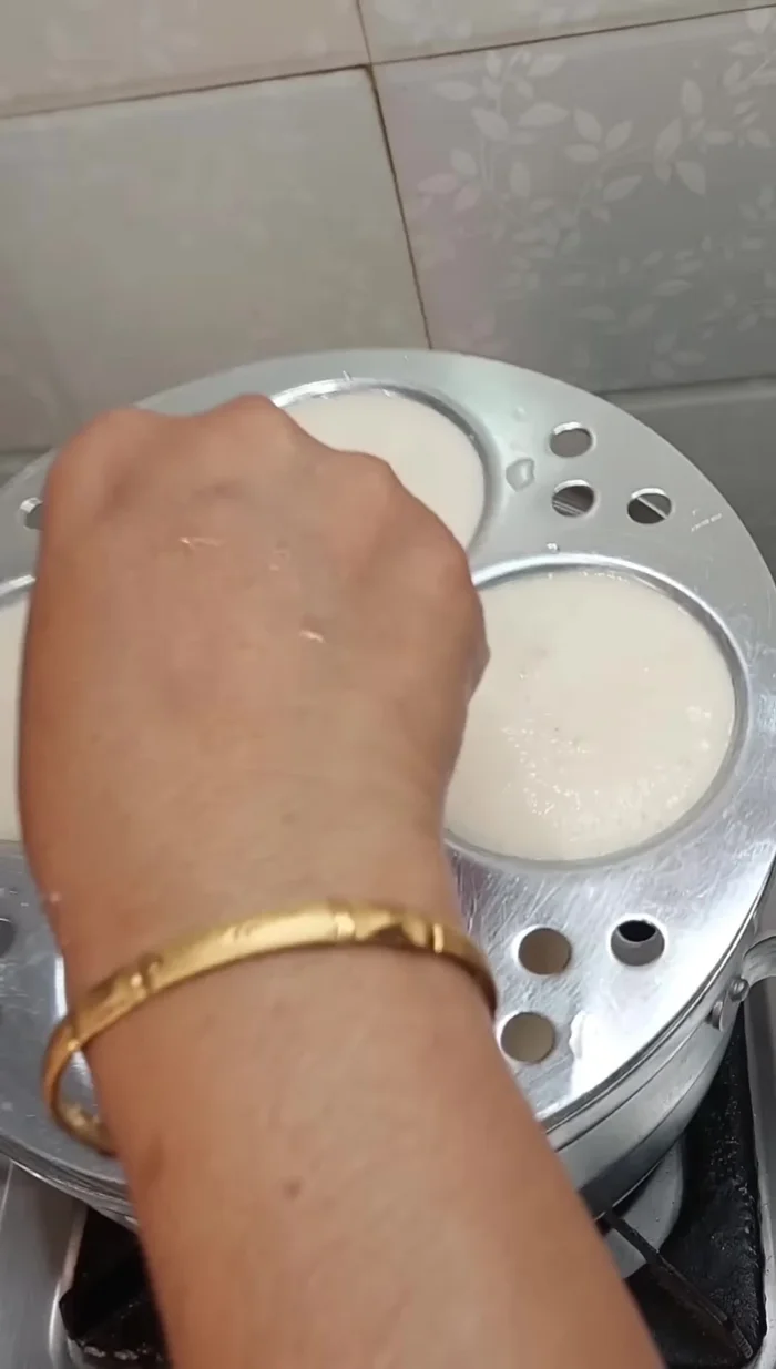 Pour batter into idli molds. Steam for 12 minutes (2 minutes on high heat, 10 minutes on low heat).