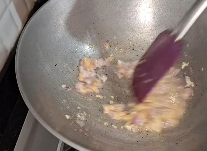 Add a medium-sized chopped onion and sauté with the garlic.