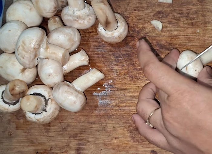 Cut mushrooms into equally sized pieces.