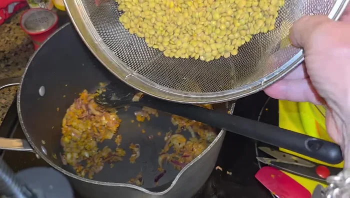 Add green lentils.