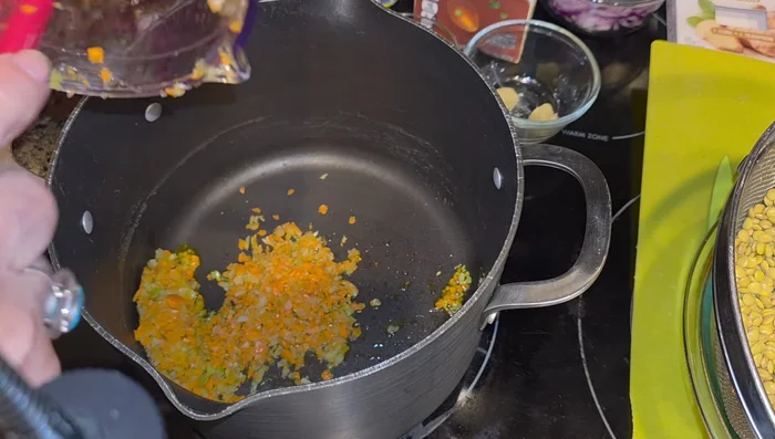 Chop carrots, celery, and one red onion thinly.