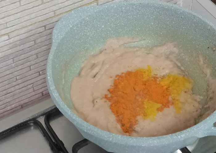 Add turmeric powder, chili powder, Kashmiri chili powder, garam masala, and coriander powder. Sauté until fragrant.