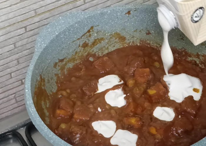 Add cooking cream, kasoori methi, and coriander leaves. Stir gently.