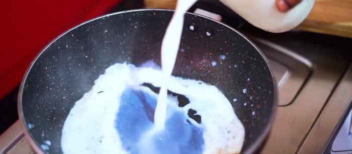Add milk to the same kadai and bring to a boil. Simmer until slightly thickened, but not too much.