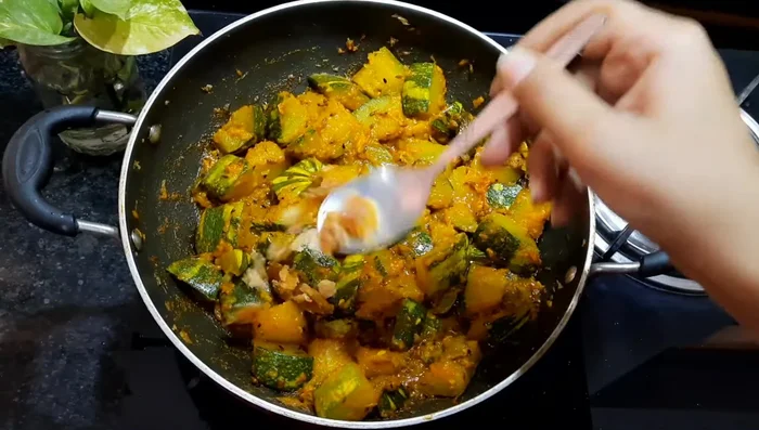 Add jaggery (or sugar), dry mango powder, and Kasuri Methi. Mix well and cook for 1 minute.