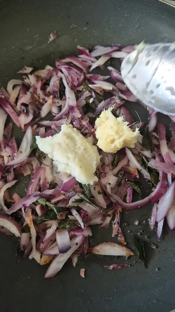 Add ginger-garlic paste, turmeric powder, and 1 tbsp of all-in-one spice mix to the pan.