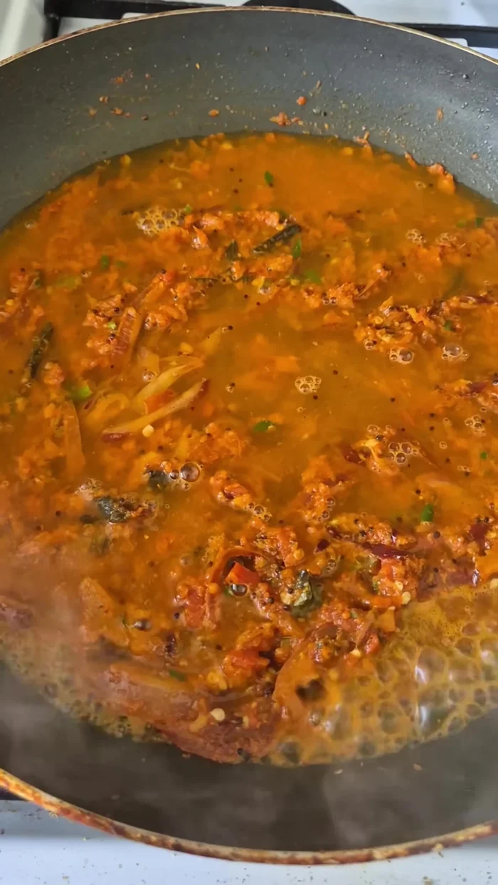 Pour in hot water and bring to a gentle boil.