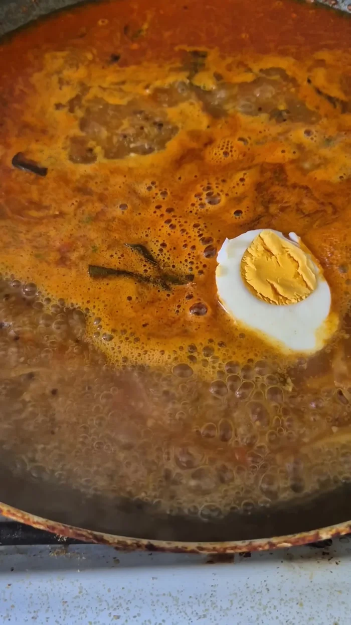 Add the boiled eggs and simmer for a few minutes.