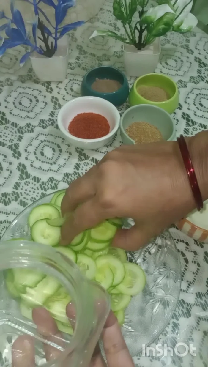 Place the cucumbers in a jar.