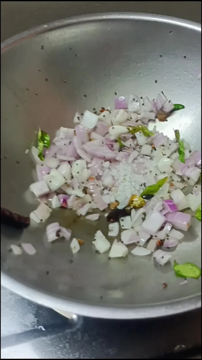 Add the pureed brinjal, tamarind, and salt to taste. Bring to a boil.