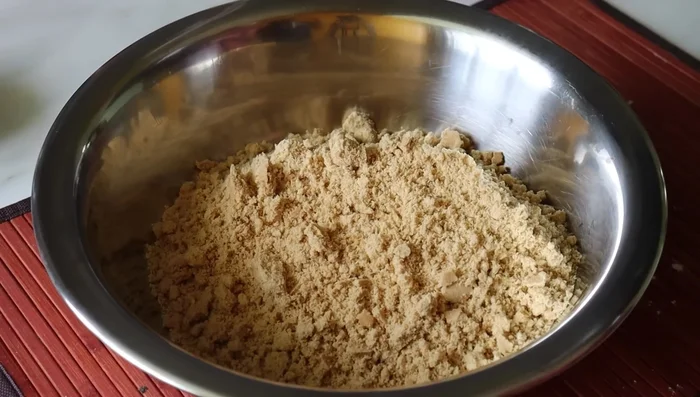 Transfer the roasted flour to a large bowl and let it cool slightly.