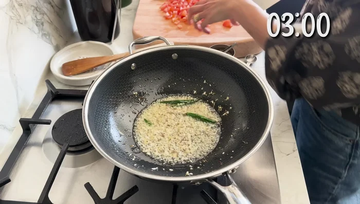Add chopped tomatoes and cook for 10 minutes until softened, reducing heat as needed.