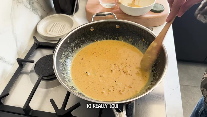 Heat the yogurt mixture gently until steam appears (this helps prevent splitting). Cover and cook for 10 minutes on low heat.