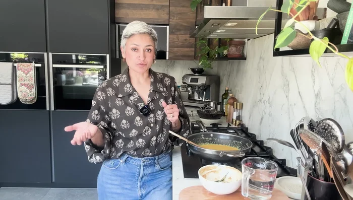 Drain and add chickpeas to the curry. Cook for another 10 minutes, covered.
