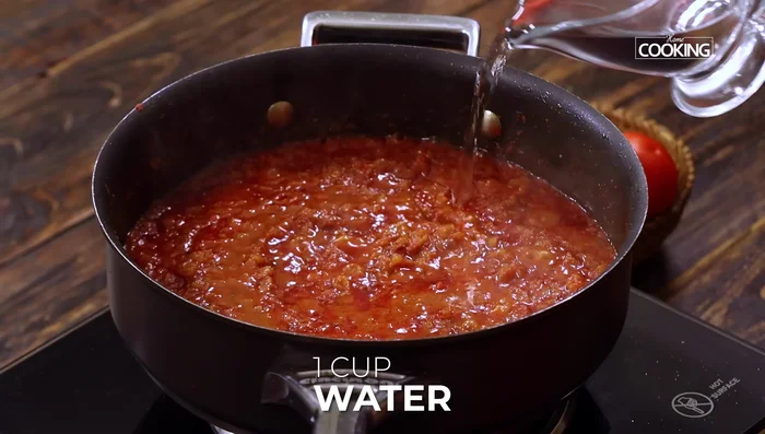 Add water to adjust gravy consistency, garam masala powder, and the grilled paneer and vegetables. Mix well.