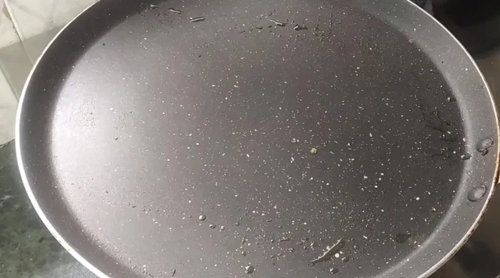 Third Method (Optional): Dip bread slices in the moong dal batter, then cook in a lightly oiled pan until golden brown on both sides. Top with chili flakes and green coriander.