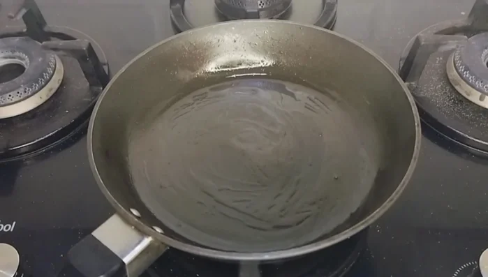 Oil/butter/ghee a pan. Take a small amount of the bread mixture and spread it thinly in the pan, similar to making a cheela (crepe). Cook on low to medium flame for 3-4 minutes per side.