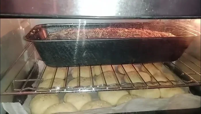 Bake for 35-40 minutes at 200°C (392°F). Brush with boiled and cooled milk midway.