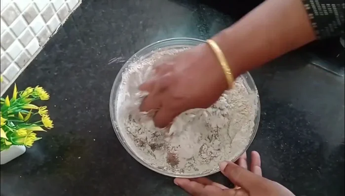 Knead the dough thoroughly. Add 2 tablespoons of oil or melted butter for softness.
