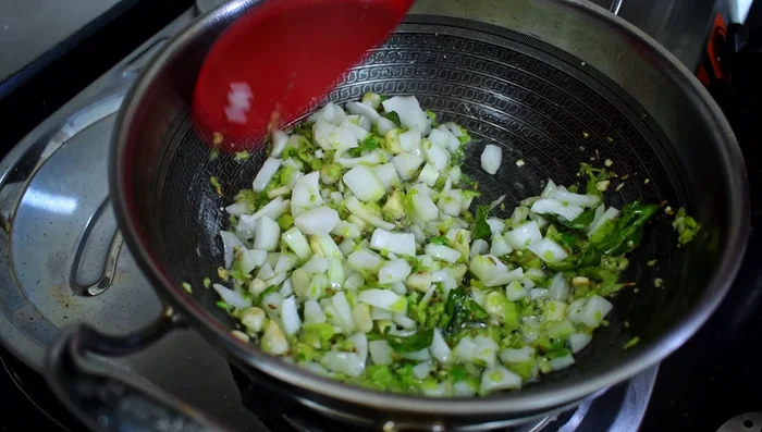 Add chopped onions and cook until softened.
