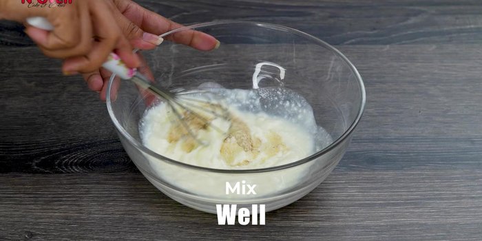 Add yogurt, 1 cup flour, and 3 tbsp semolina. Mix until smooth and lump-free.