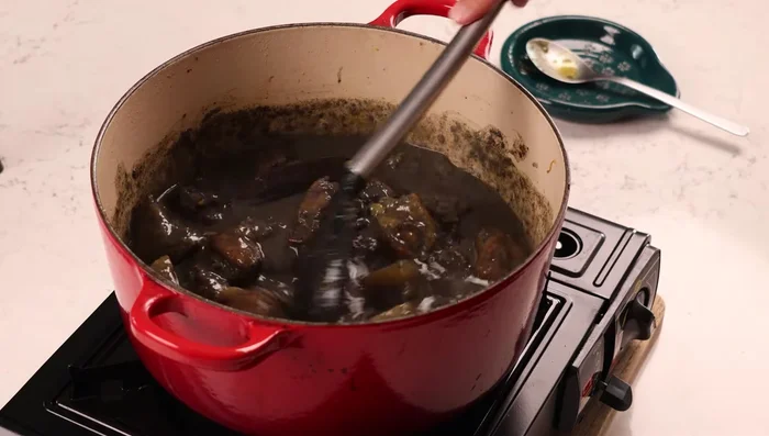 Simmer until the sauce thickens.