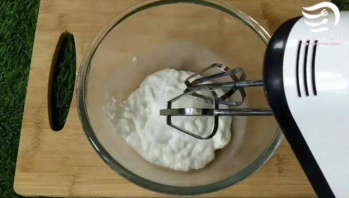 In a bowl, beat 1/2 cup of well-chilled whipping cream until soft peaks form. If you don’t have a mixer, you can whisk it by hand, but it will take longer.