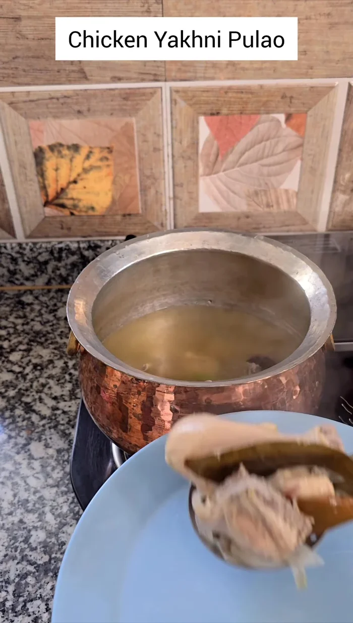 Remove the chicken and strain the stock, setting both aside separately.