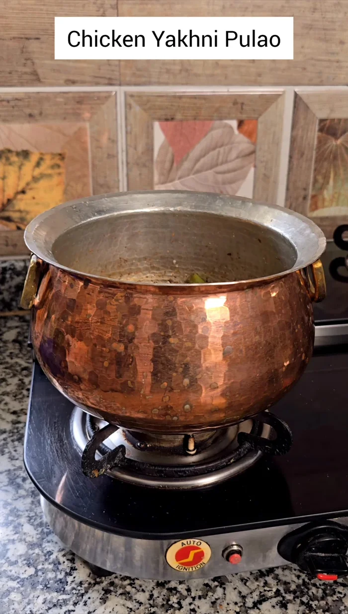 Add soaked (30 minutes) basmati rice to the pan. Add the reserved chicken stock.