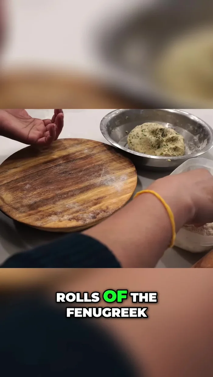 Make small balls of the dough and roll them into flat circles.