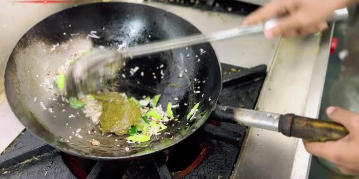Add the prepared gongura paste (made from washed and ground gongura).