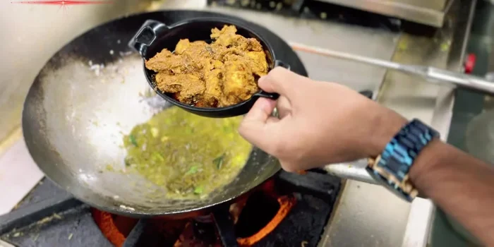Add boiled and spiced chicken.
