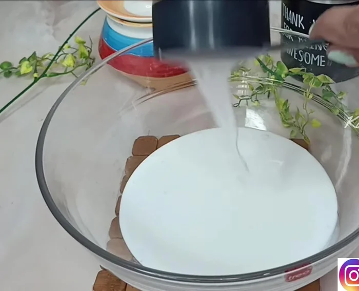 Whip the chilled non-dairy whipping cream until soft peaks form (avoid over-whipping).